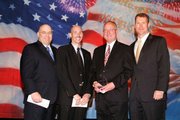 Quorum Health Resources recently announced that The Memorial Hospital in Craig earned the company's 2012 Best Performing Critical Access Hospital. Above, from left to right, are Robert A. Vento, QHR senior vice president of operations; Bryan Chalmers, TMH chief financial officer; George Rohrich, TMH chief executive officer; and James L. Horrar, QHR president and CEO.
