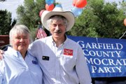 Jo Ann Baxter, a candidate for Colorado House District 57, meets with fellow Democrat Roger Wilson, representative for District 61, on Saturday during Silt Heyday in Garfield County.
