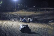 Drivers in the modified stock car race jockey for position as they try to catch HD Craig (front) Saturday during the race at Thunder Ridge Motorsports Park. Craig won the race. Thunder Ridge has another event set for this Saturday at 7:30 p.m.