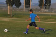 Derek Maiolo, a junior at MCHS, chases after the ball at soccer practice this summer. Maiolo has played soccer before, but this will be his first season playing for Moffat County High School. He is one of several players who will need to contribute for the Bulldogs to have a big year, according to coach Rusty Cox.