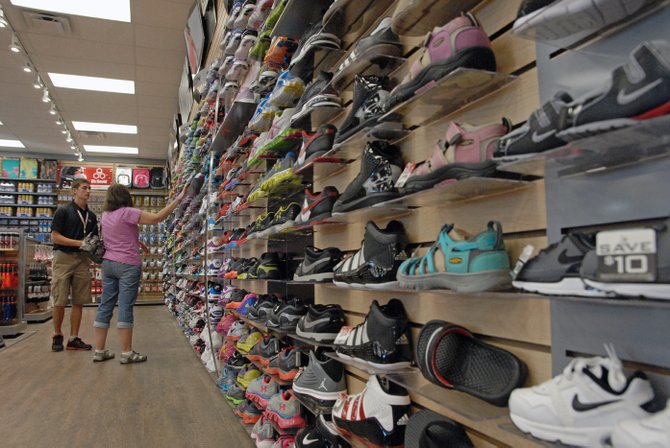 What shoe brands are featured at Hibbett Sports?