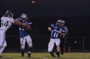 Moffat County quarterback Bubba Ivers attempts a pass during the second quarter against Delta Friday night. The Bulldogs lost the game at the Bulldog Proving Grounds, committing six turnovers.