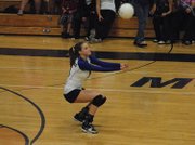 Lisa Camilletti digs a hit out Tuesday night at Moffat County High School. Camilletti, a senior, had 13 assists to lead the Bulldogs in their win over Grand Valley.