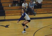 Junior Allie Ehlers prepares to dig the ball Tuesday night during the Moffat County volleyball team's match at MCHS. The Bulldogs won in five sets, and Ehlers led the way with 13 kills.