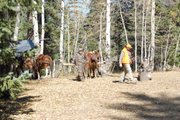 Mike Schoby (right) and Kevin Howard return from their hunt the morning of Oct. 2 at the Elkhorn Outfitters Pilot Camp.