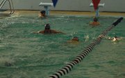 Members of the Moffat County girls swimming team swim laps during practice at the MCHS pool. The girls team has 18 members this year, a significant increase of their normal numbers, coach Meghan Francone said.