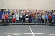 Ridgeview Elementary School first graders perform Thursday afternoon in the school gym during their school concert.