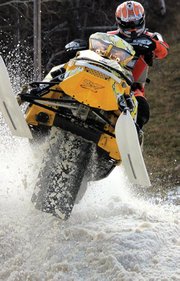 Wesley Chapman rides his snowmobile at the International Series of Champions Duluth National Snocross event last week. Chapman, 18, and friends Austin Gabbert and A.J. Stoffle attended the international race in Duluth, Minn. to kick off the Snocross season.
