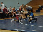 Shandon Hadley wrestles Grand Valley's Ricardo Malta Thursday at Moffat County High School. Hadley lost to Malta in the 132-lb. match.
