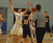 Joe Camilletti tries to intercept a pass during the second half of Moffat County's 75-50 win over Basalt Friday in Craig.