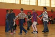 Sunset Elementary School second graders perform a dance Wednesday. Students in first through fifth grade gave dance performances all day for parents and family.