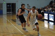 Joe Camilletti gets by an Aspen defender during a home game at the beginning of the month. Camilletti scored 10 points Friday night as the Bulldogs beat Coal Ridge in New Castle, 77-64