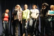 Maureen Moore, Second from the left, program director for Peabody Energy’s Leaders in Education, asks Craig Middle School students why seventh grade science teacher Brynna Vogt, left, is a great teacher during a surprise assembly.