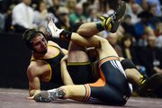 160-pounder T.J. Shelton, left, of Meeker, scrambles against Del Norte’s Austin McDonald en route to winning 8-2 in the Class 2A final during the Colorado State High School Wrestling Championships. Shelton had a successful stint as a Bad Dog wrestler before starting high school in Meeker.