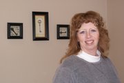 Deborah Powell stands in the office of JOPPA Insurance Agency, which she opened at the beginning of March. The office is in American Northwest Realty at 105 East Victory Way.