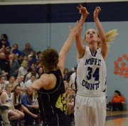 Bailey Hellander puts up a jumper for Moffat County during the regional game against Jefferson Academy Friday.